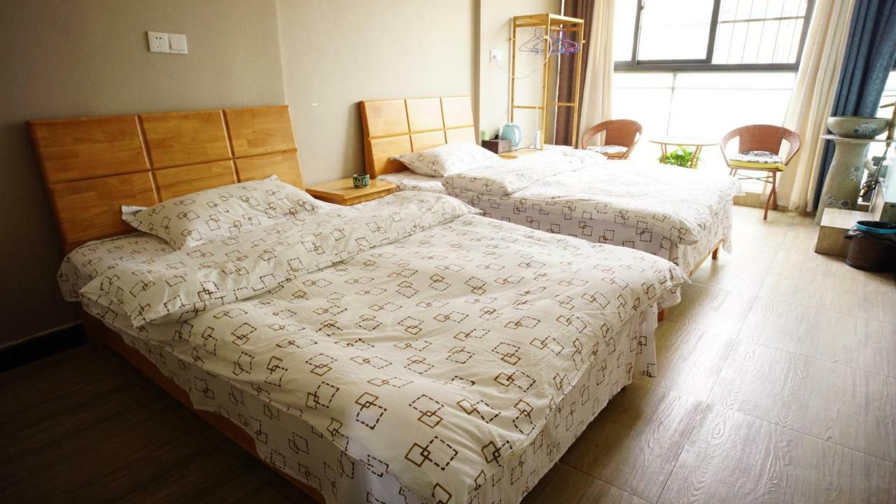Huanlesong Youth Hostel Γουχάν Δωμάτιο φωτογραφία